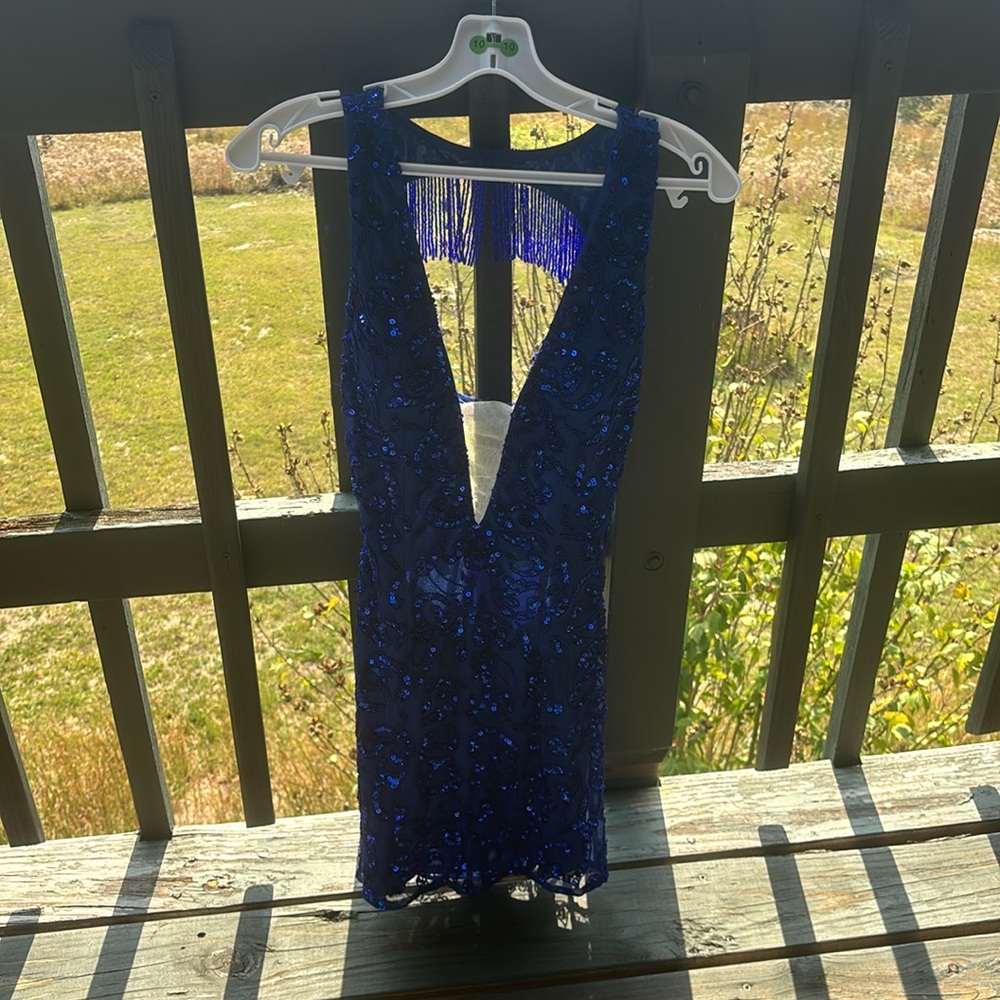 Blue sparkling dress, jean Ann, never wore, in perfect condition. Open back!